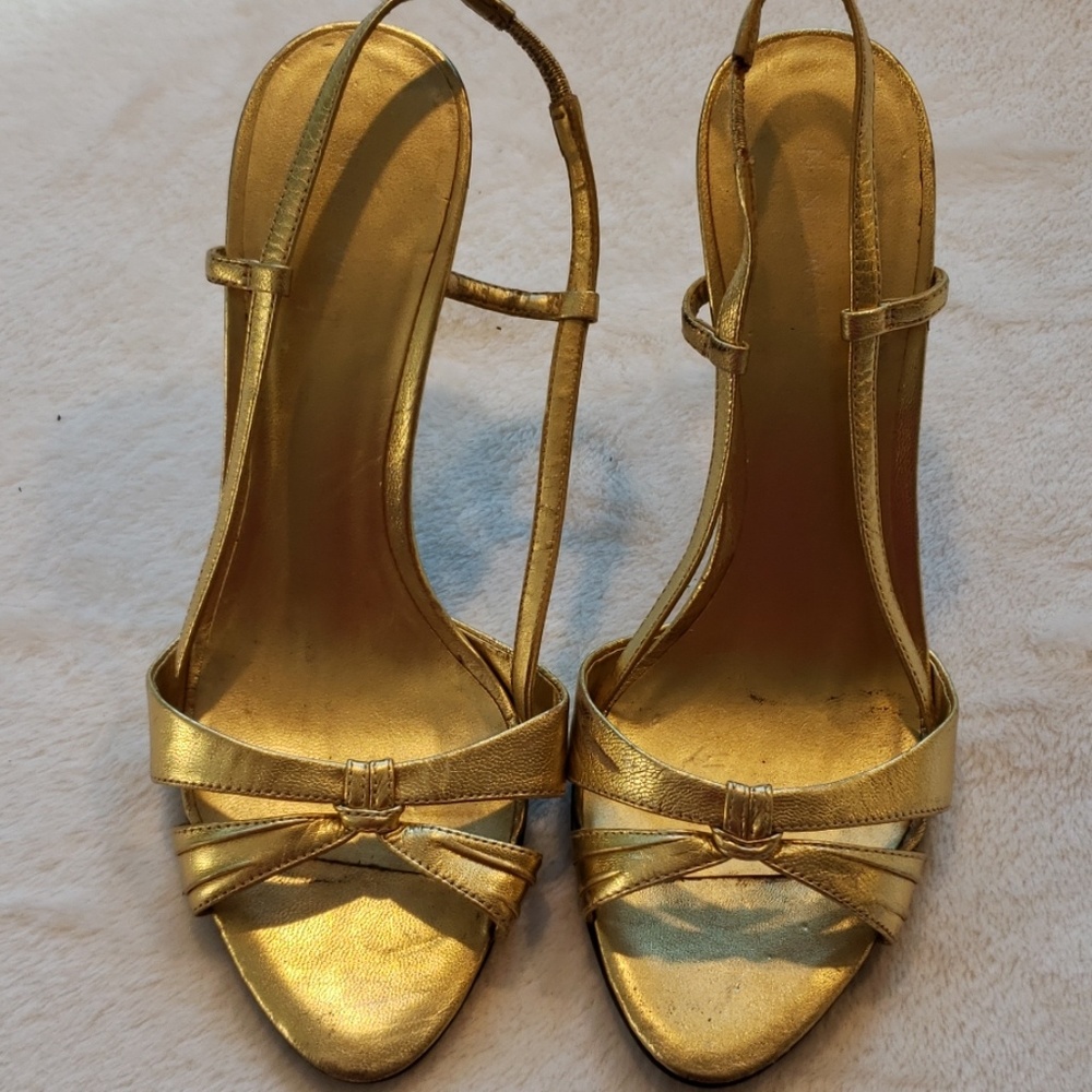 Gold healed strappy sandles.
